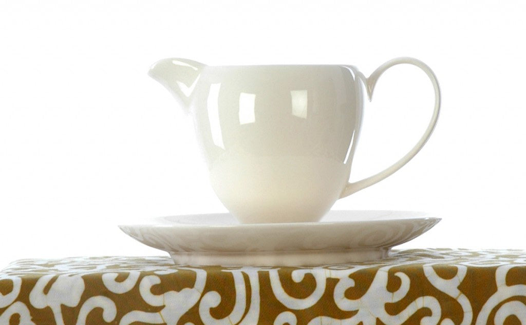 Ivory cream milk jug with stand