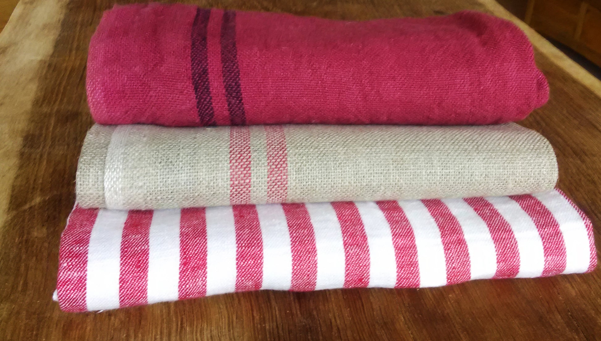 A set of 3 mixed linen tea towels in red