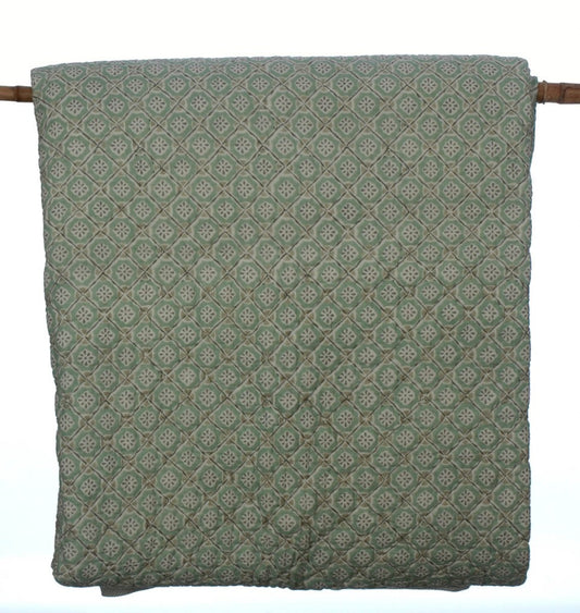 Hand block printed cotton quilt in pale sea green